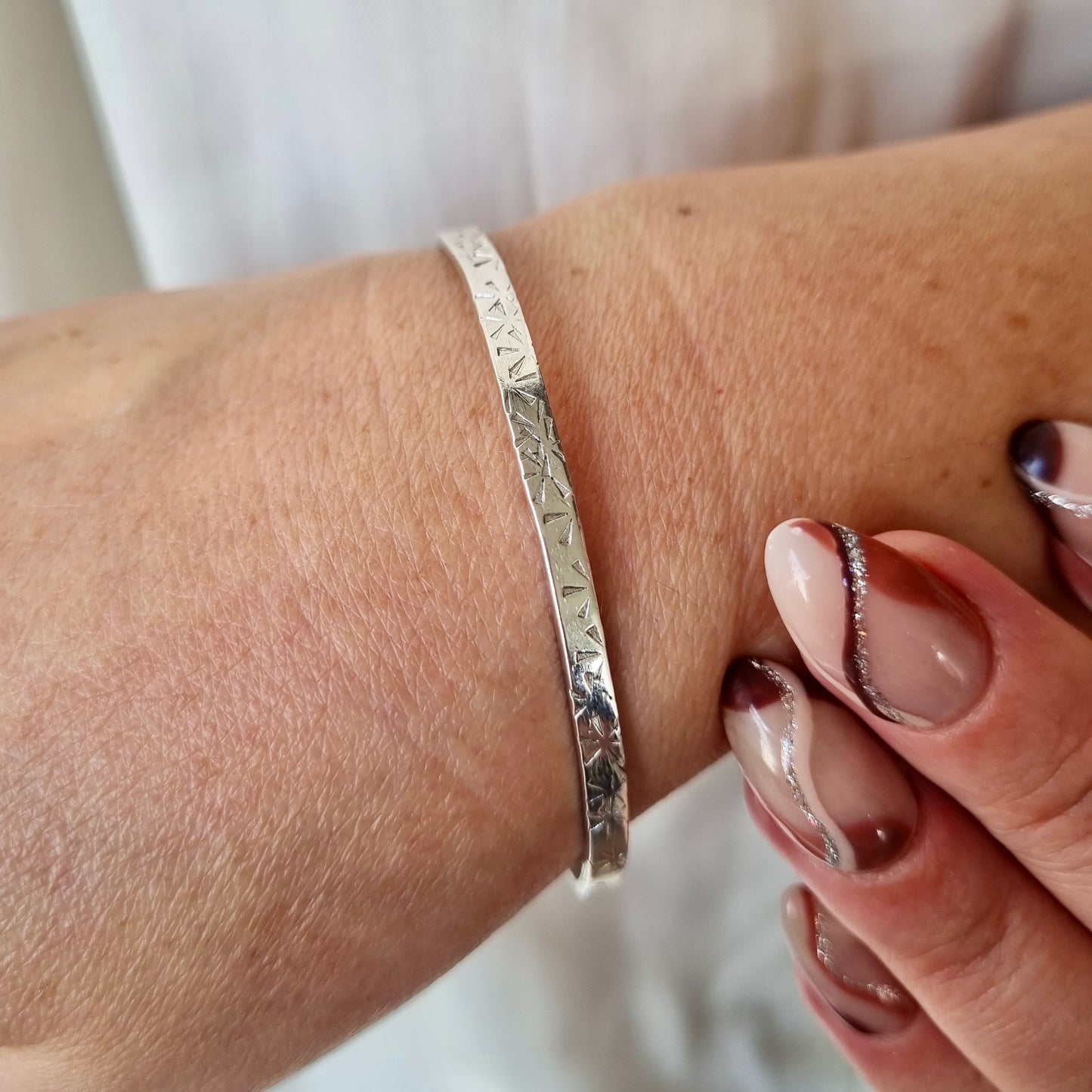 Sunburst - Silver bangle with sunburst detail