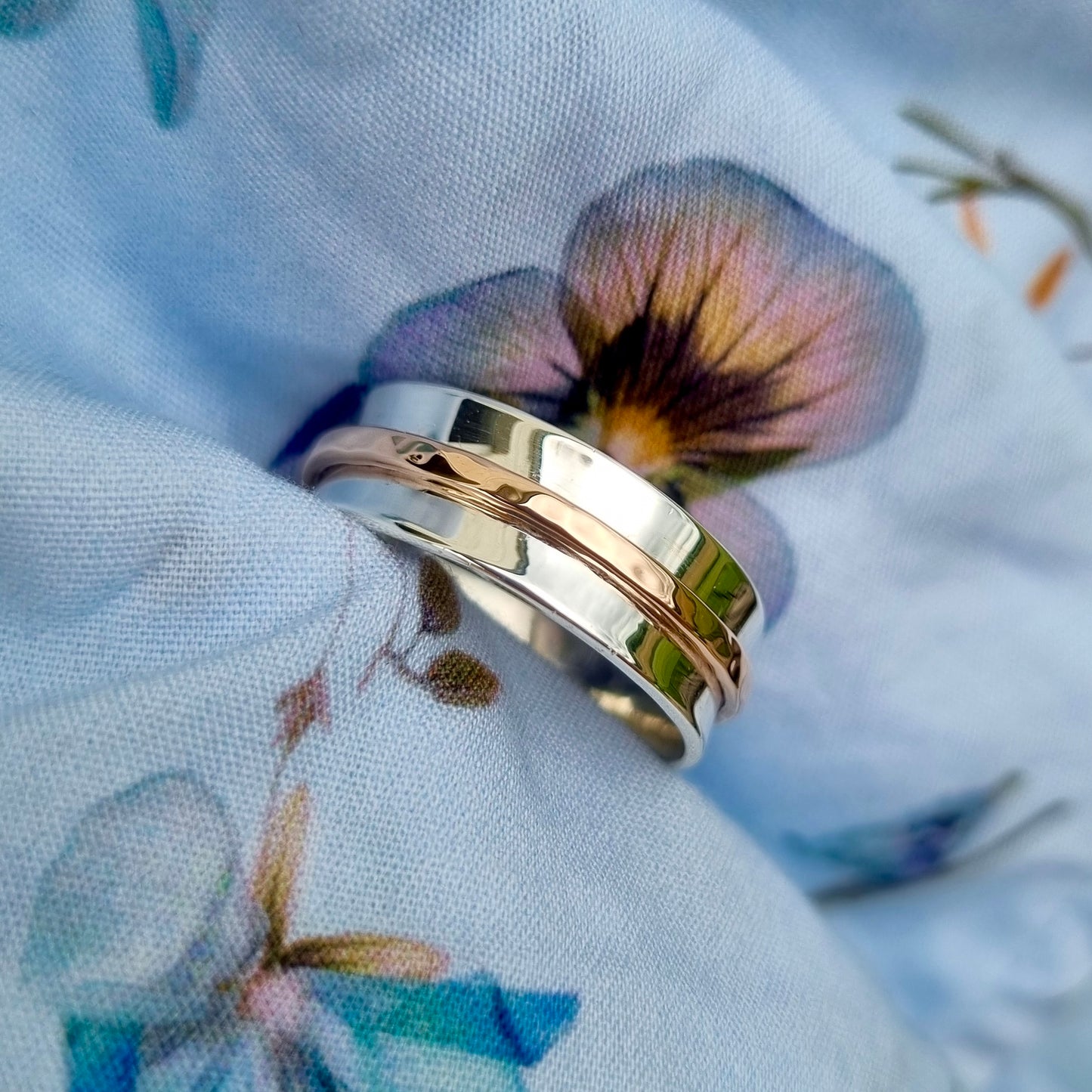 Reflections spinning ring