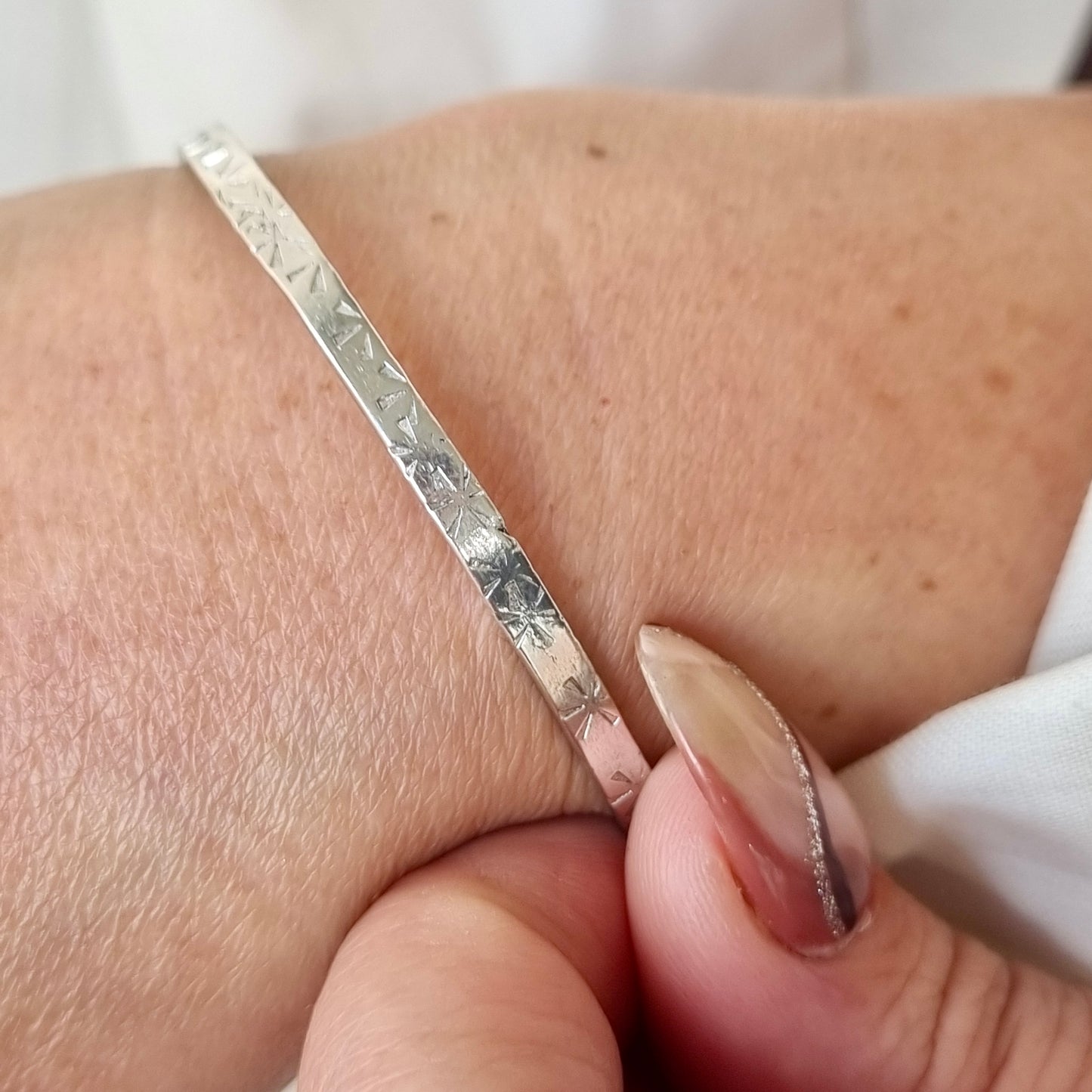 Sunburst - Silver bangle with sunburst detail