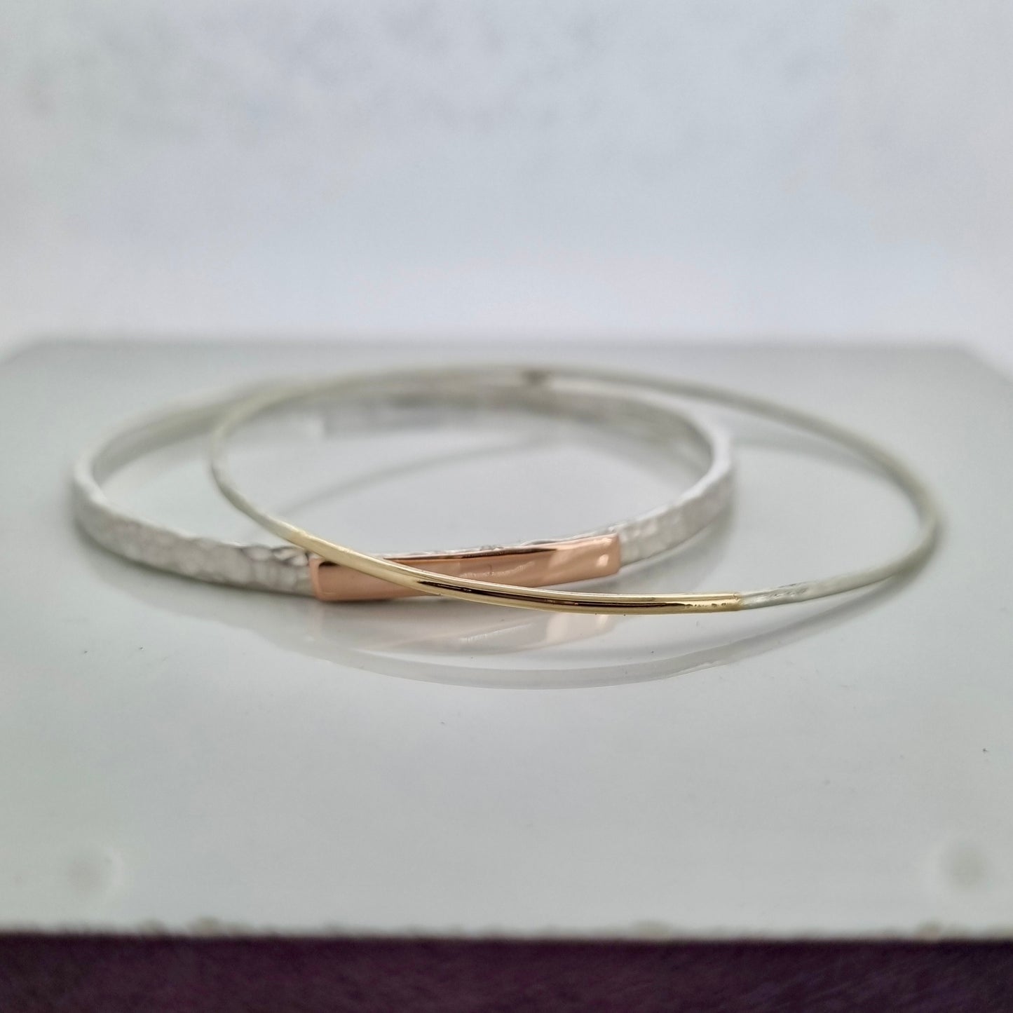 Inch of strength - silver hammered bangle with an inch of gold