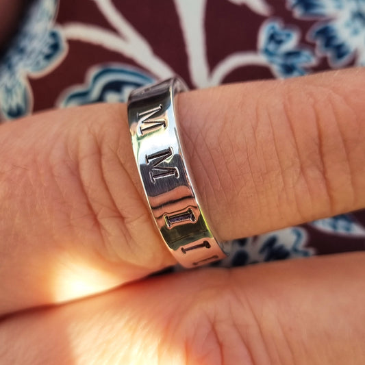 Personalised man's ring with Roman numerals. Sterling silver