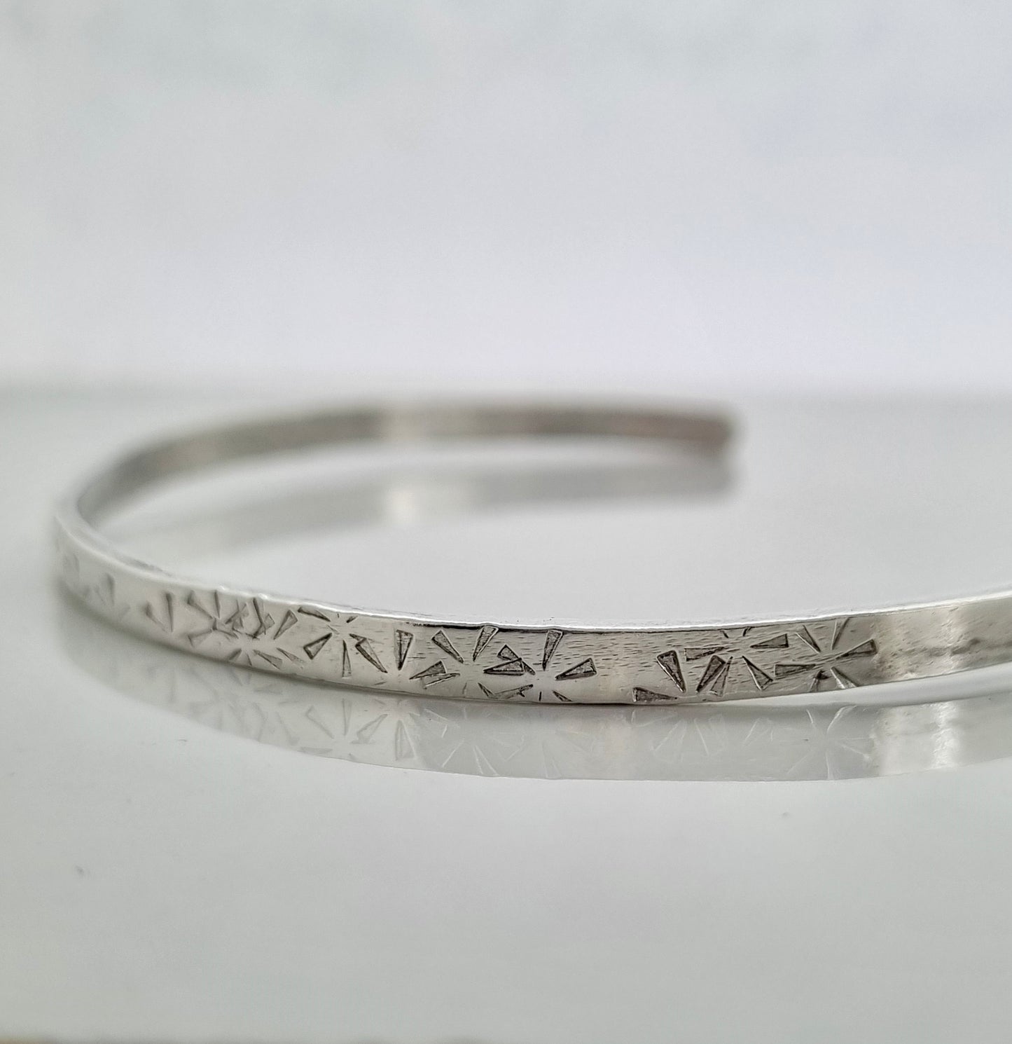 Sunburst - Silver bangle with sunburst detail