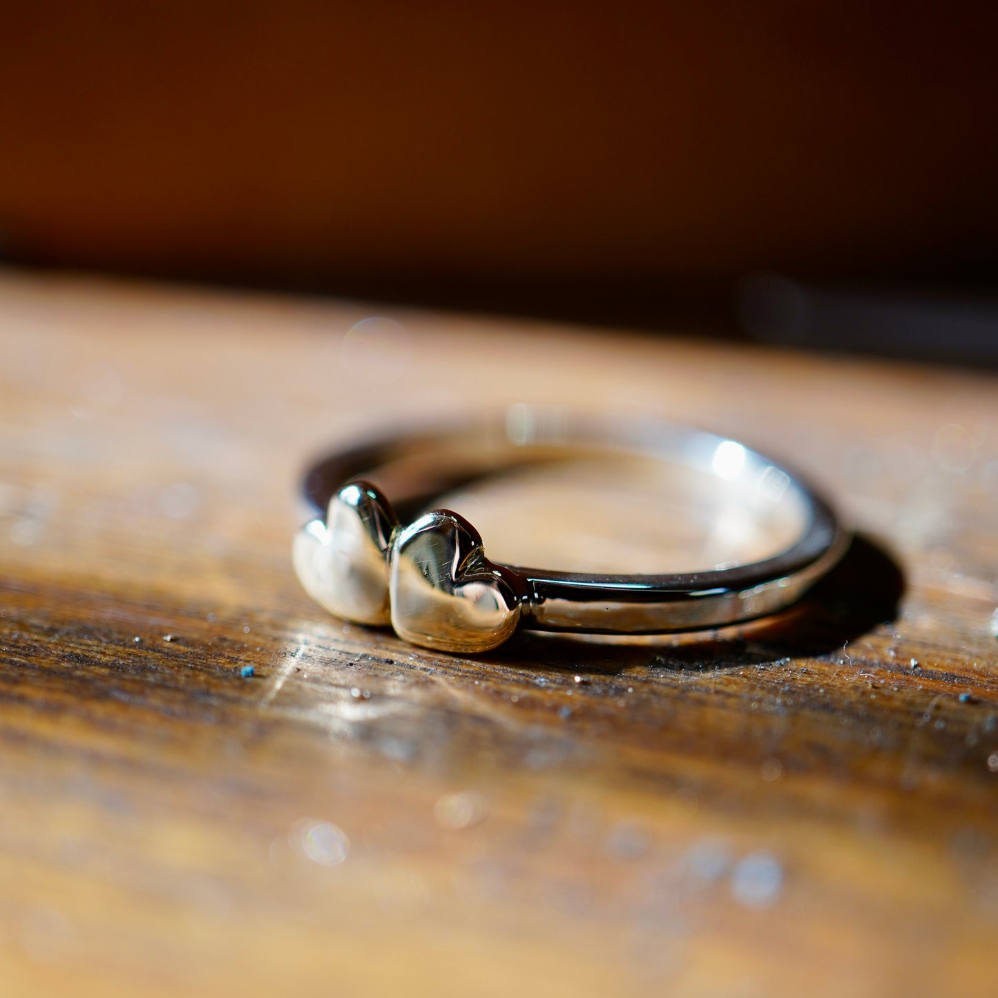 2 gold hearts with medium band