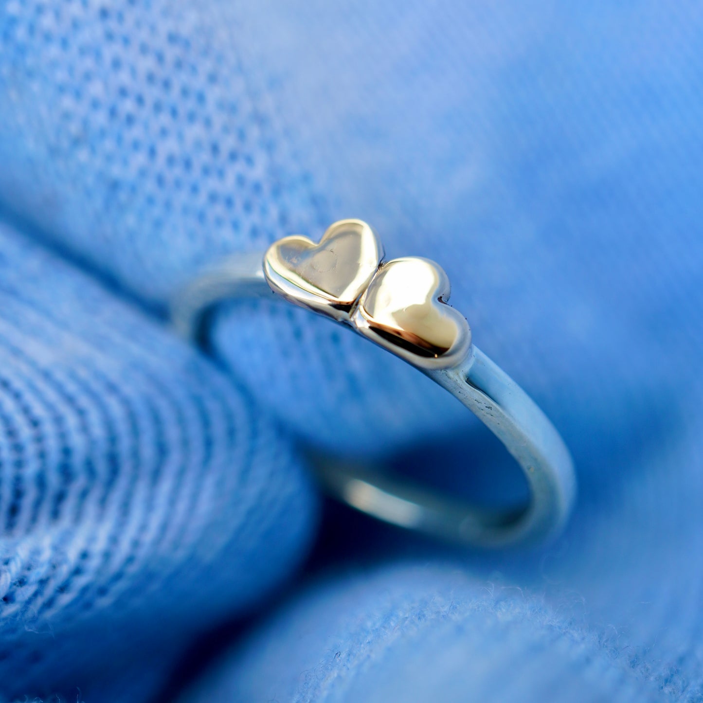 2 gold hearts with medium band