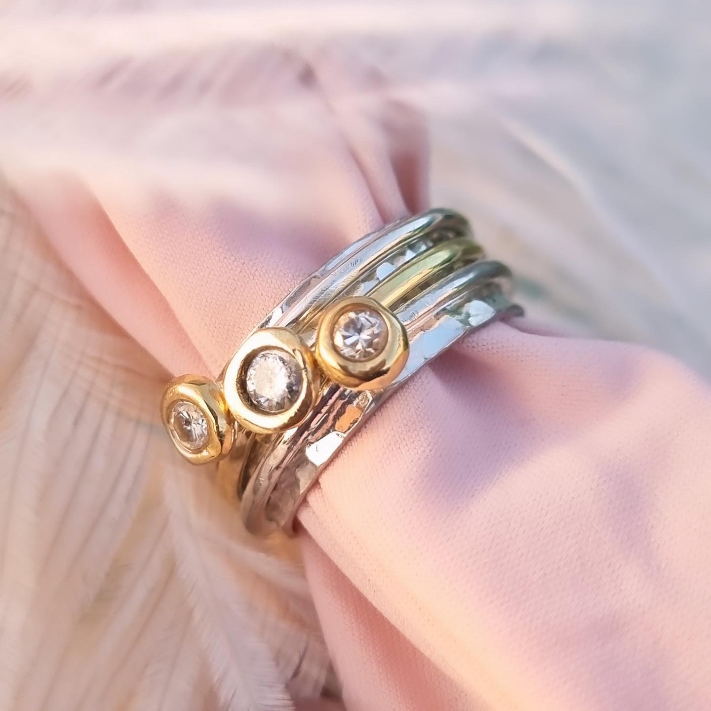 'Cariad' spinning ring handmade with solid gold, silver and diamonds