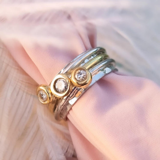 'Cariad' spinning ring handmade with solid gold, silver and diamonds