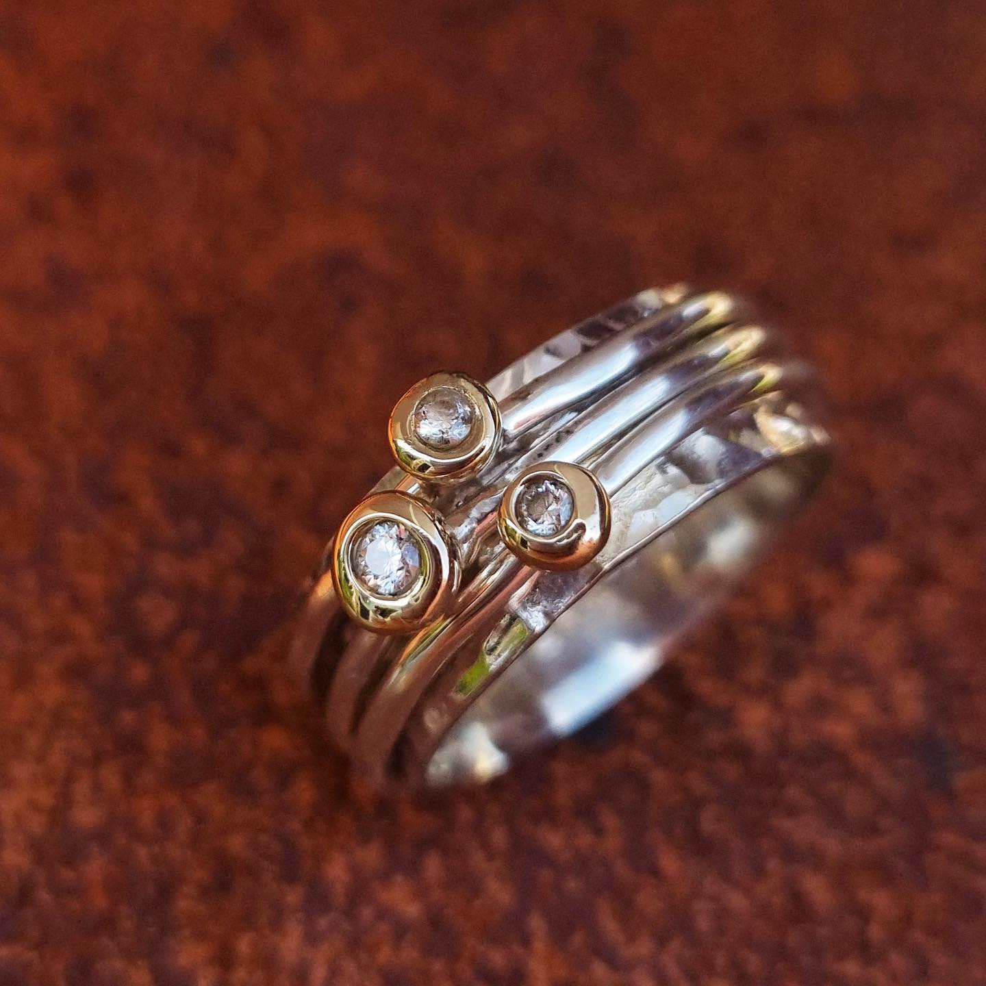 'Cariad' spinning ring handmade with solid gold, silver and diamonds