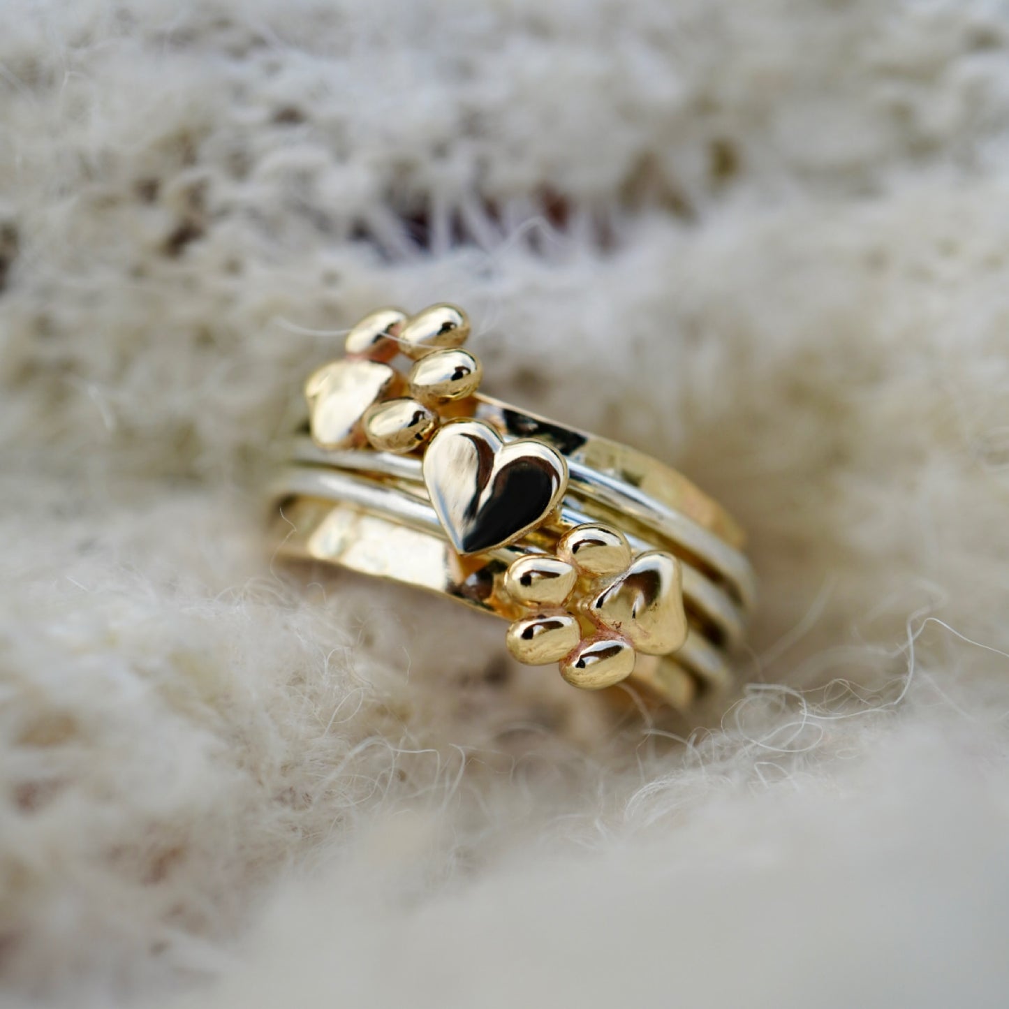 Paw spinning ring with solid gold or silver paw