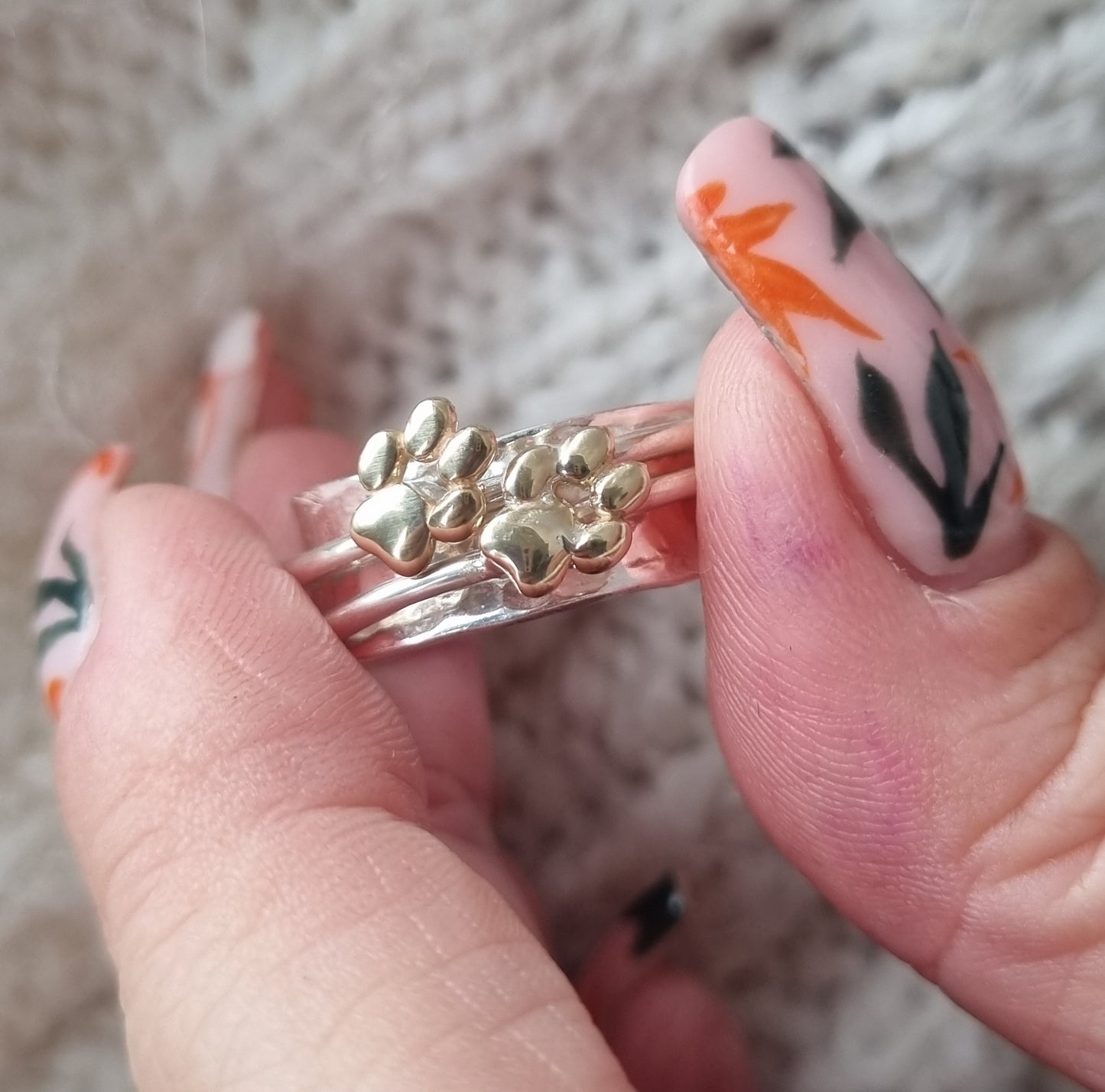 Paw spinning ring with solid gold or silver paw