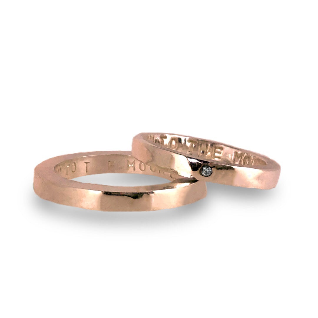 Gold wedding bands with sparkling diamonds