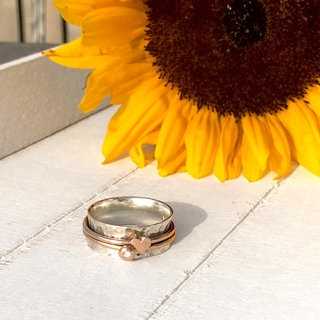 'Eternal love'. Solid silver ring set with gold heart and diamond.