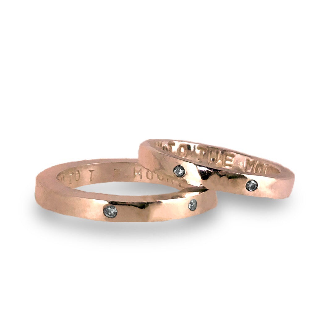Gold wedding bands with sparkling diamonds
