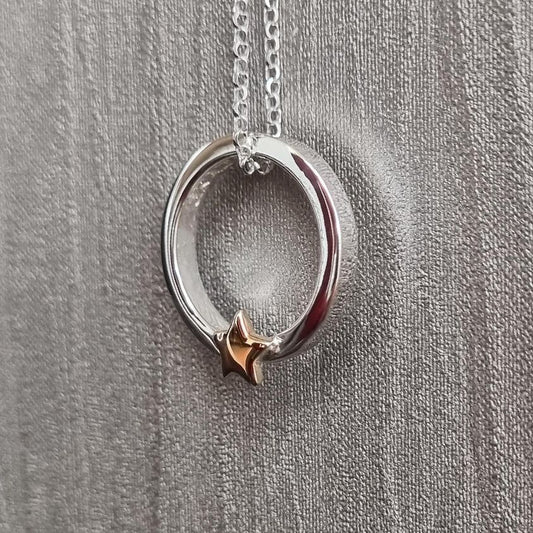 ‘It's in the stars’ - Silver necklace with solid gold star