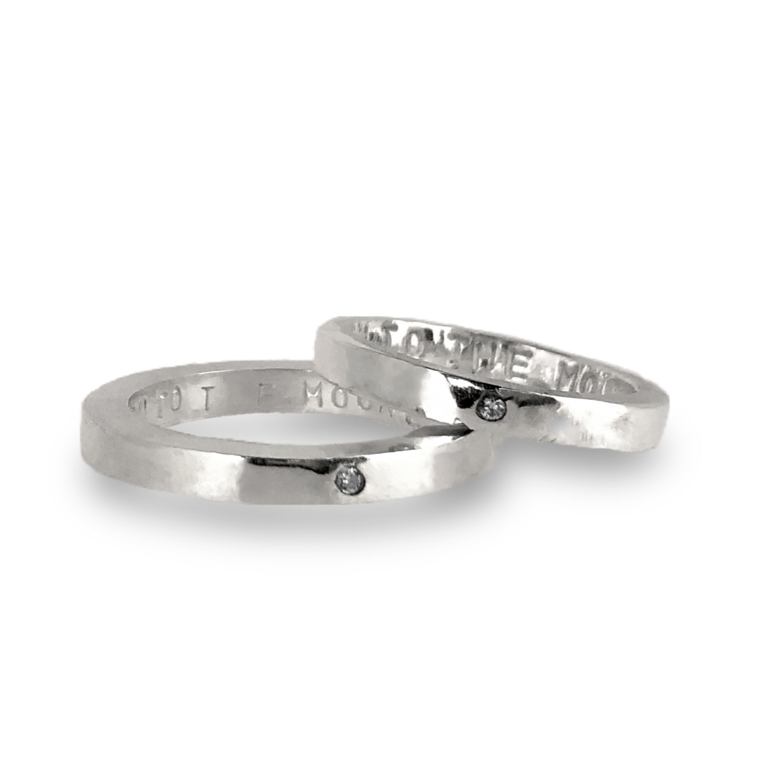 Gold wedding bands with sparkling diamonds