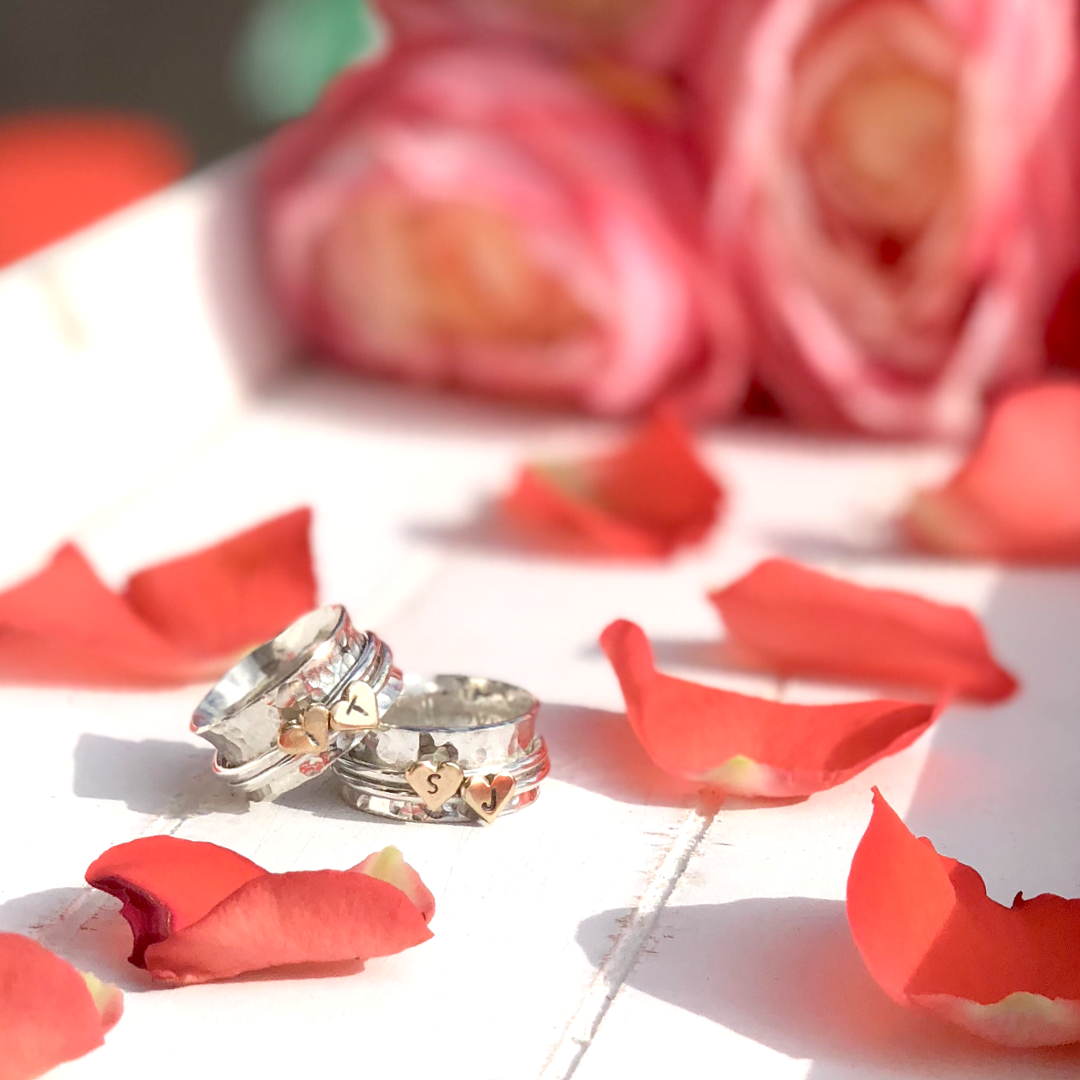 Two hearts beat as one. Her and her wedding rings