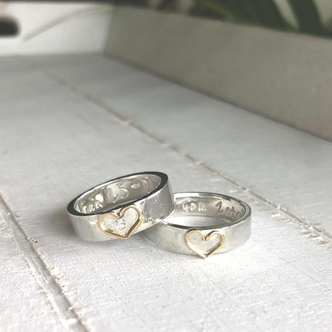 Silver band with 18ct gold open heart. Add a diamond for extra sparkle.