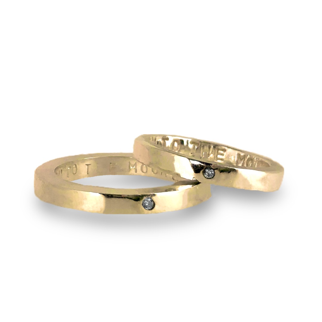 Gold wedding bands with sparkling diamonds