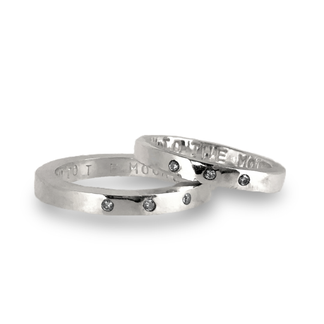 Gold wedding bands with sparkling diamonds