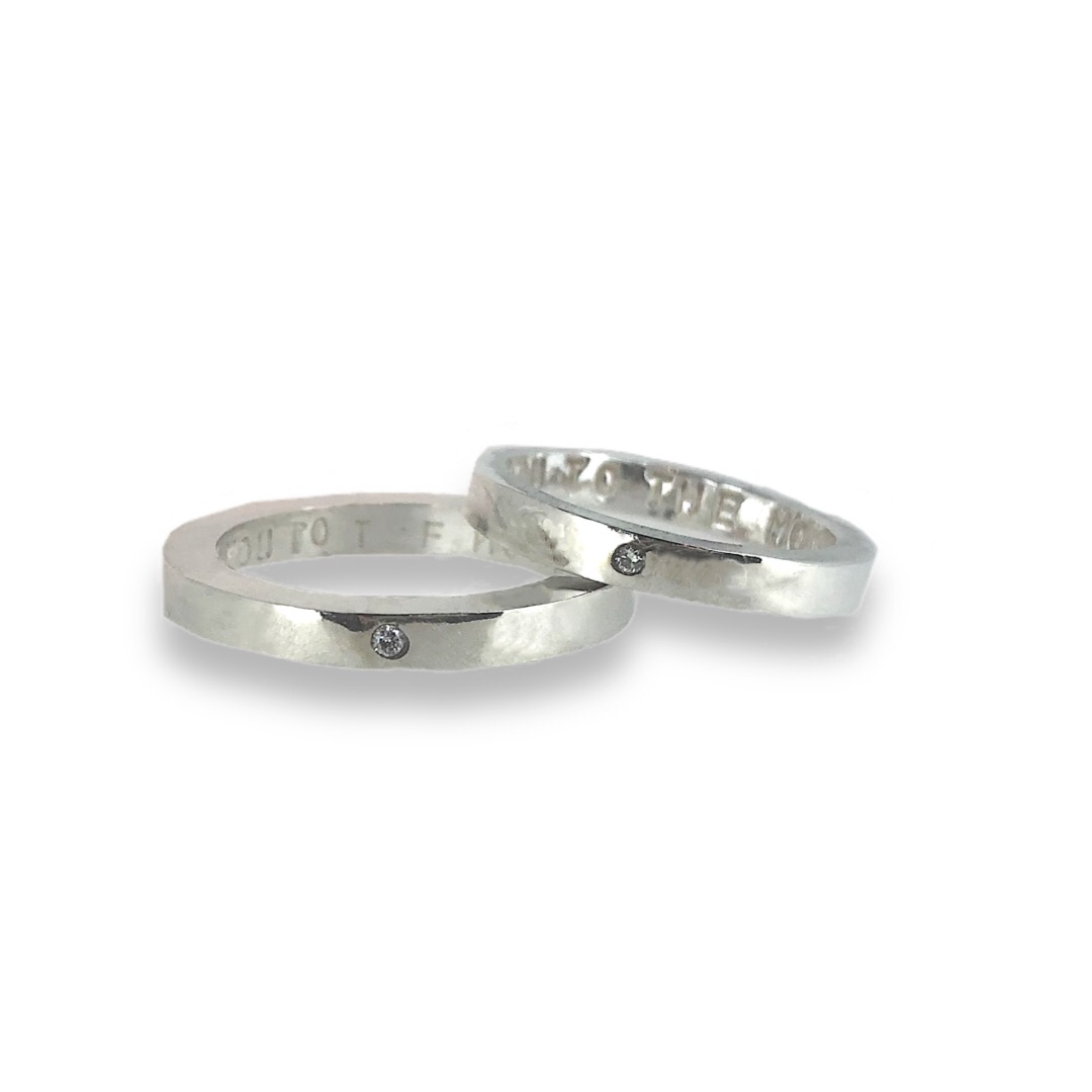 Gold wedding bands with sparkling diamonds