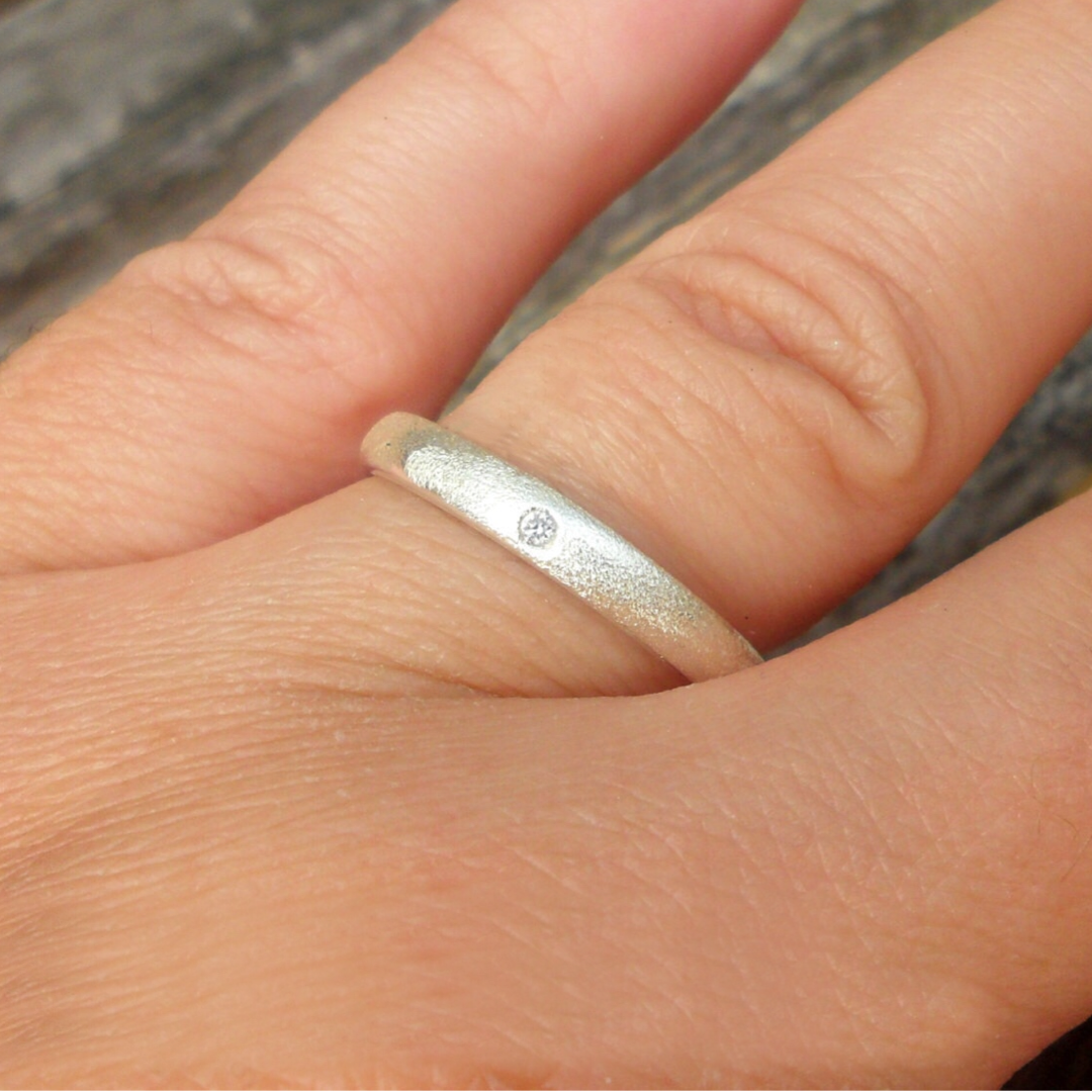 Sterling silver ring set with diamond