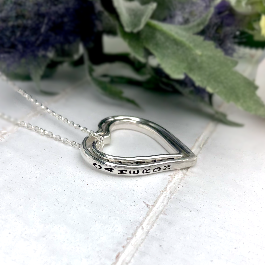 Family of hearts necklace. Five personalised hearts.