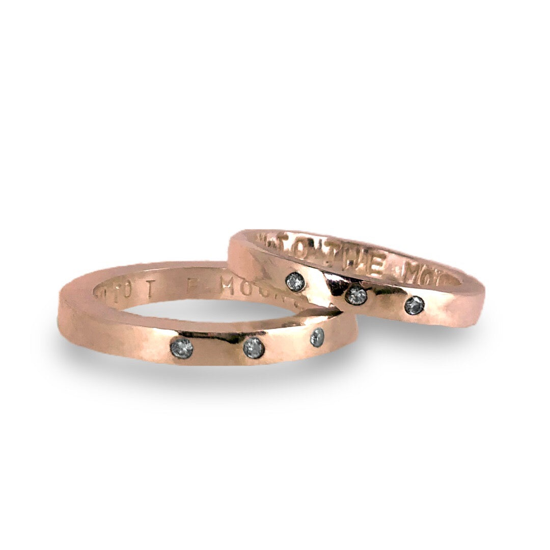 Gold wedding bands with sparkling diamonds