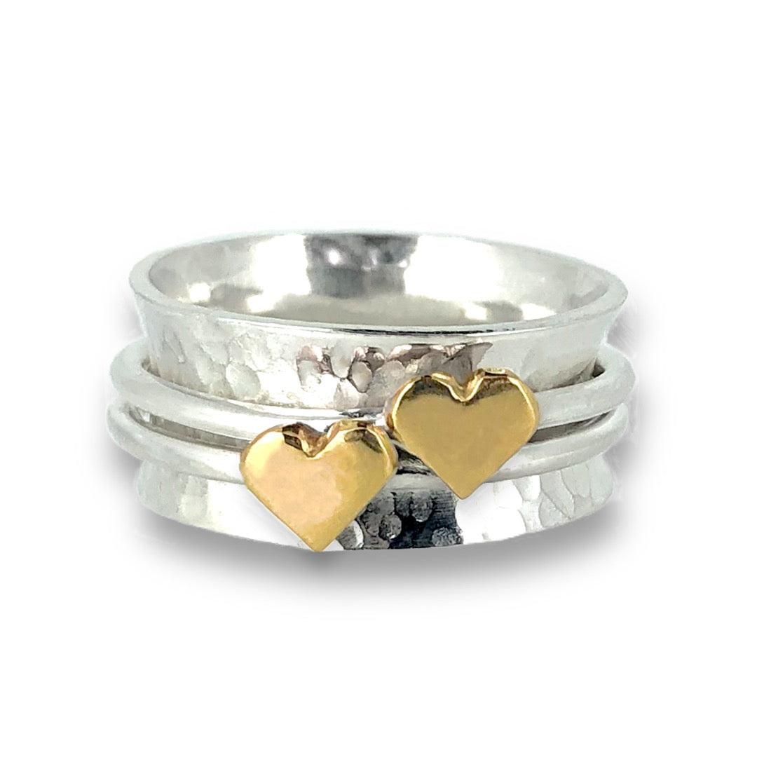 Two hearts beat as one. Gold or silver hearts.