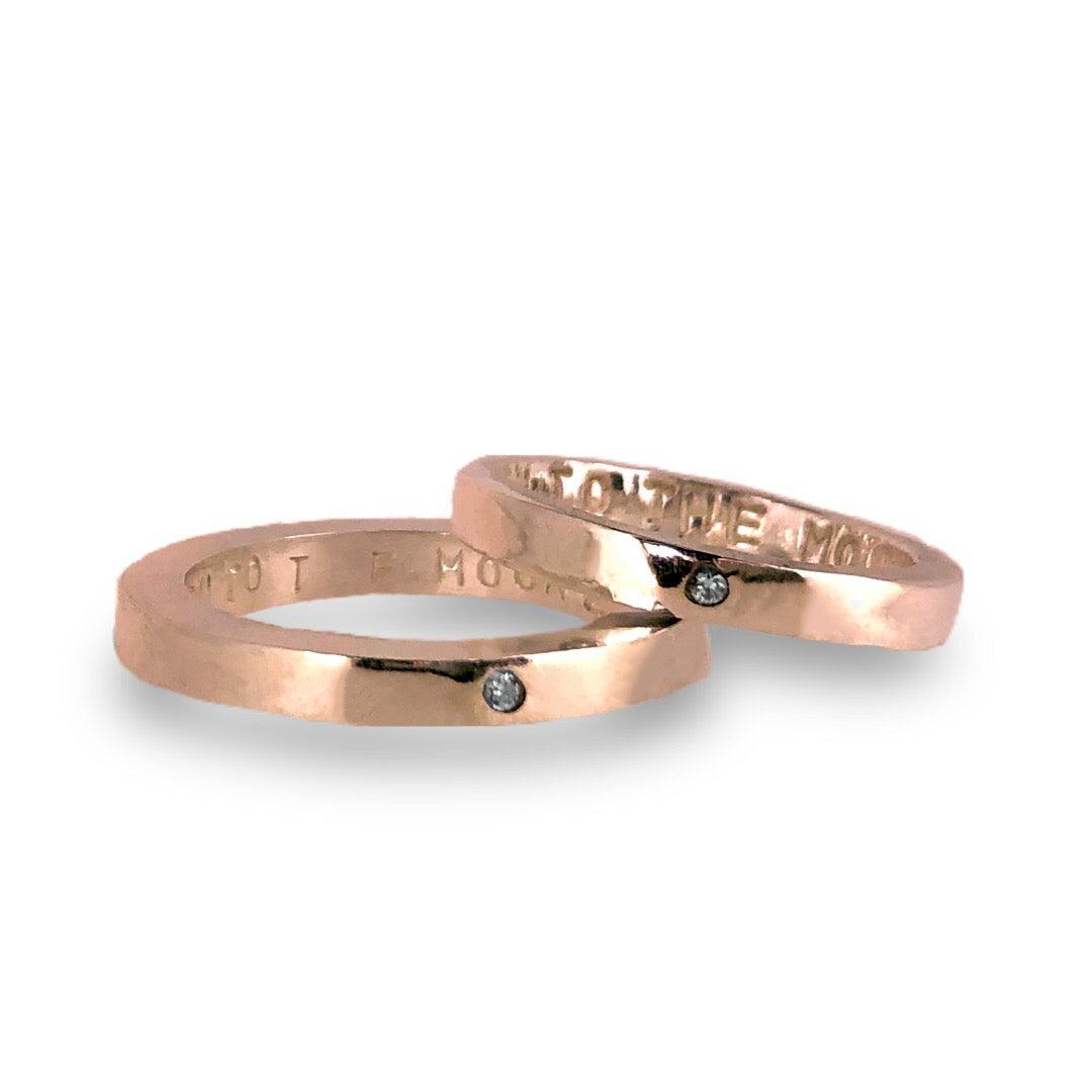 Gold wedding bands with sparkling diamonds
