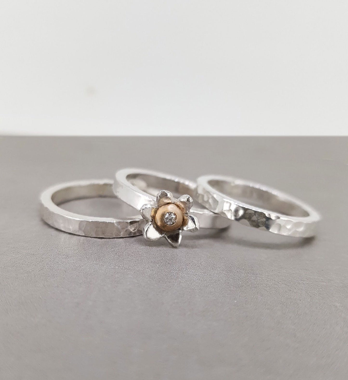 Flower stacking set handmade from solid silver with gold detail and diamond