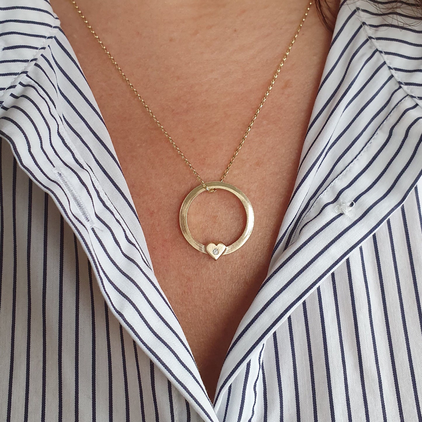 Solid gold ‘One love’ necklace with gold heart and diamond