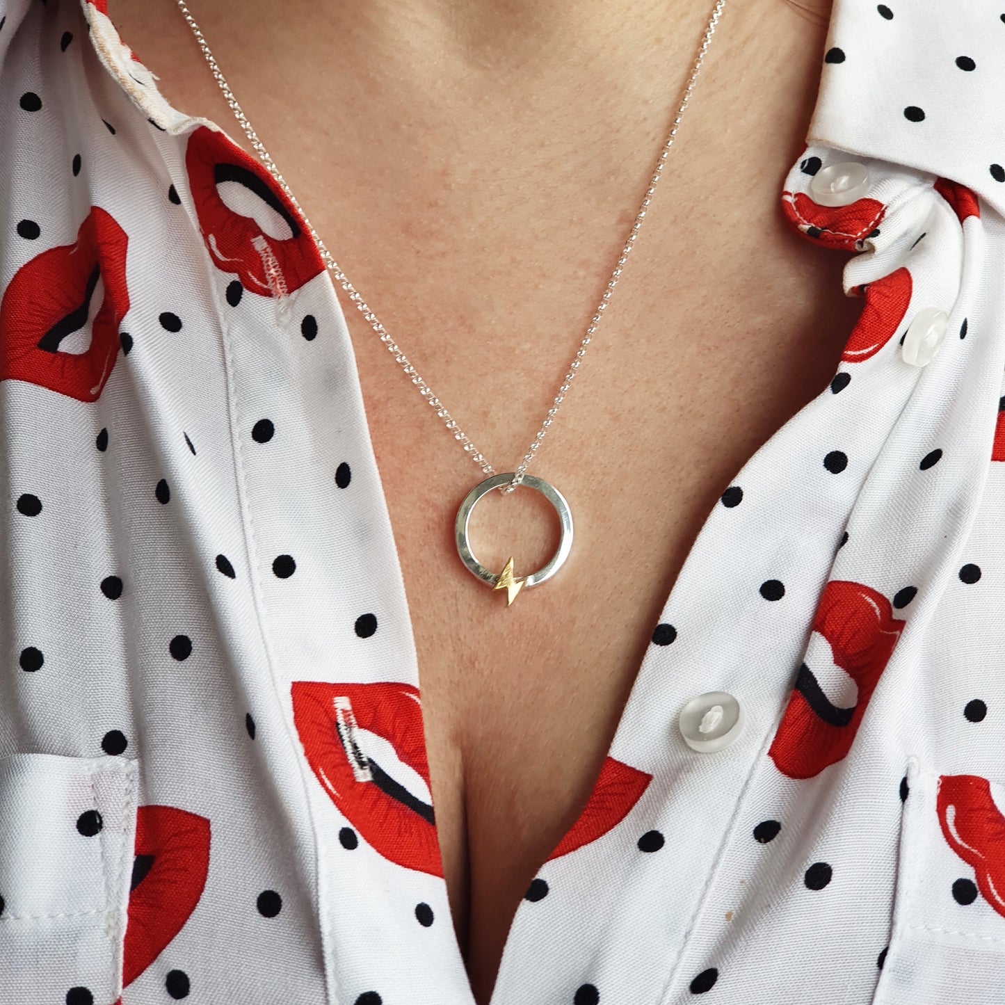 “One Power” necklace with solid gold lightning bolt