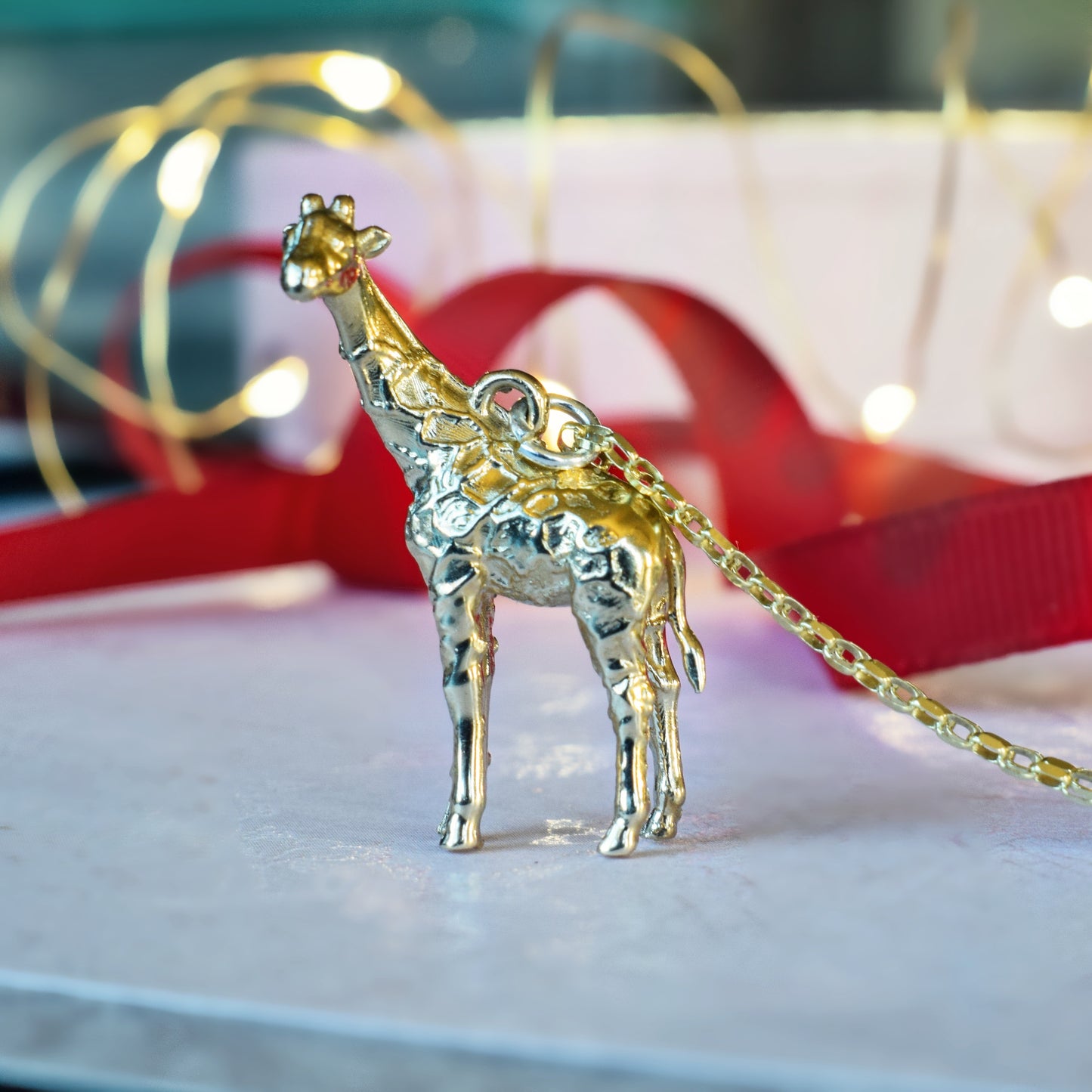 Solid silver or gold giraffe necklace