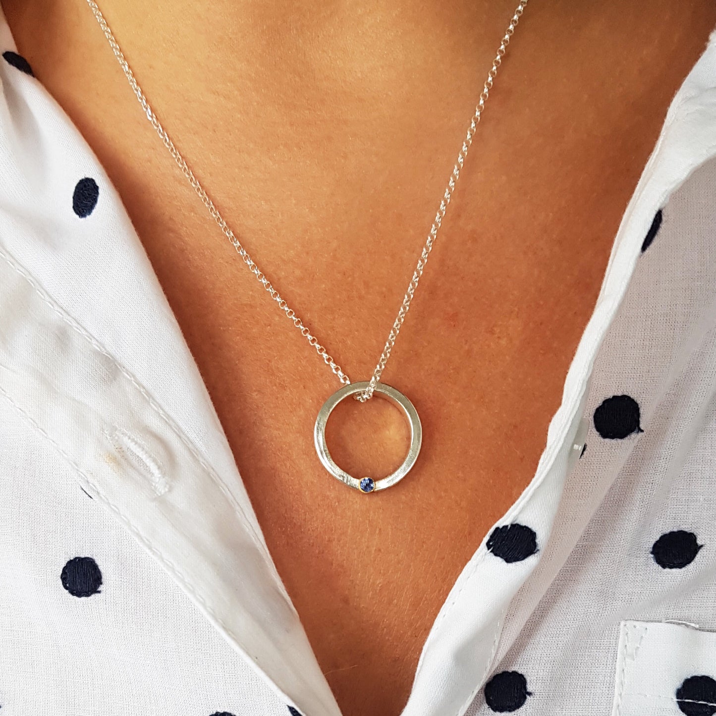 Halo necklace with gemstone set in 9ct gold