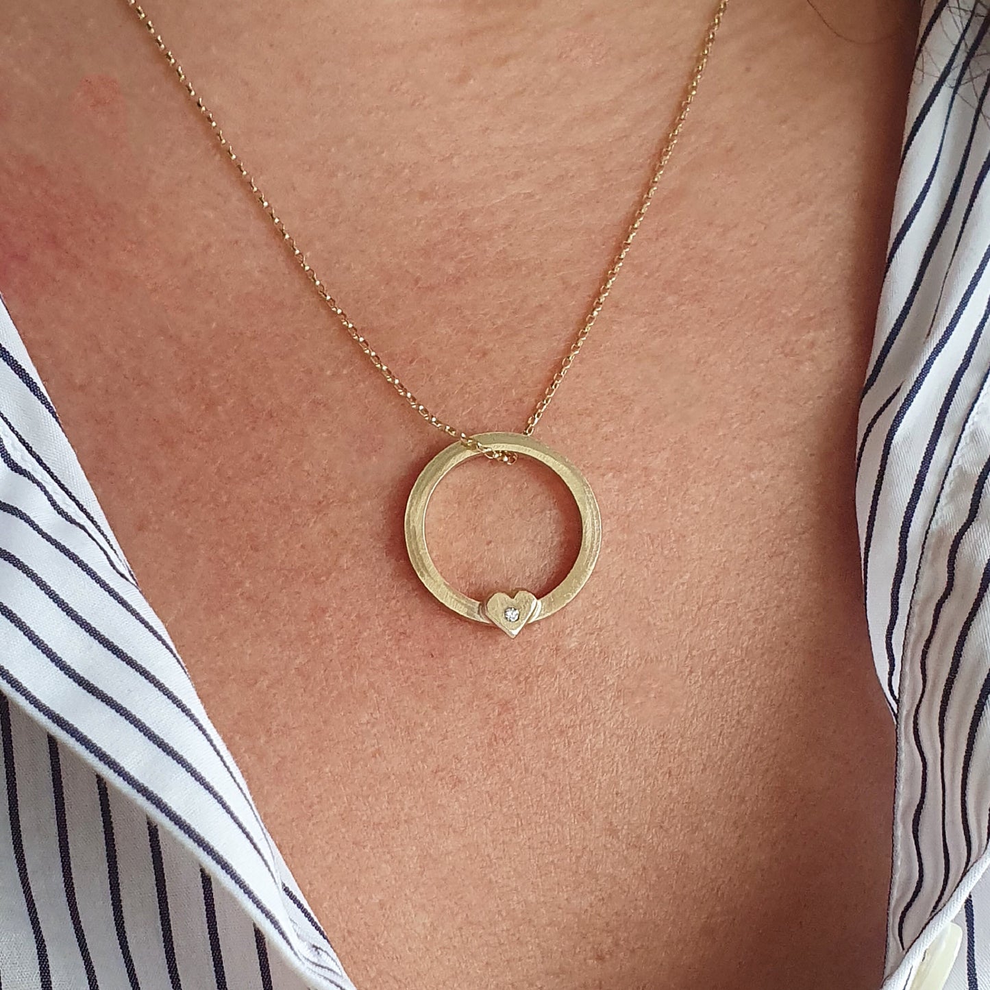 Solid gold ‘One love’ necklace with gold heart and diamond