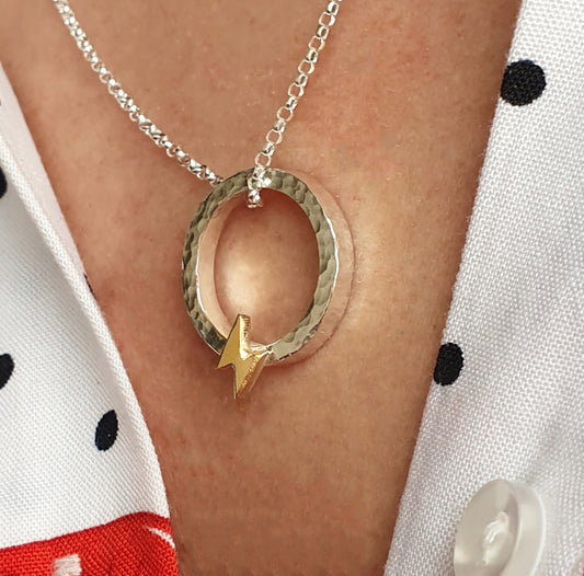 “One Power” necklace with solid gold lightning bolt
