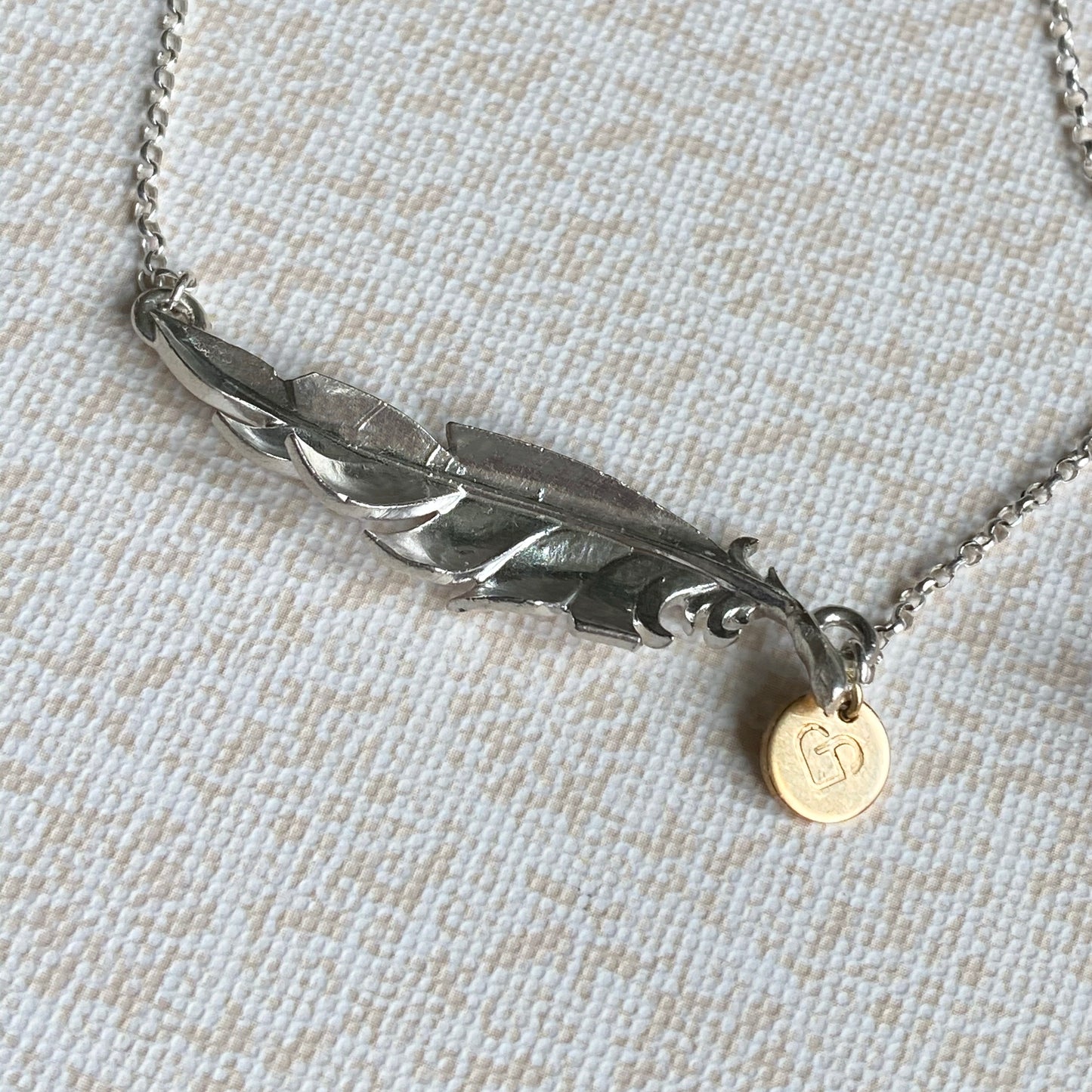 When you're near - Personalised silver feather necklace.