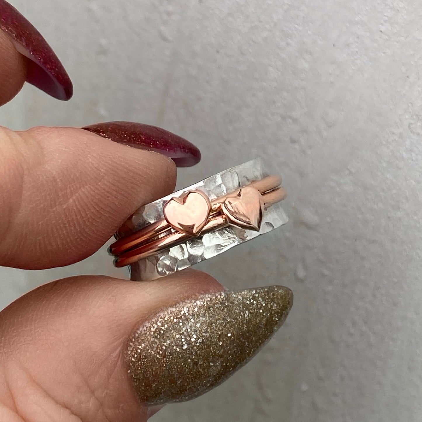 Two hearts beat as one. Gold or silver hearts.