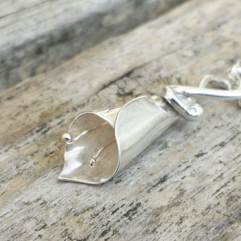 Sterling silver lily necklace with gleaming 9ct gold anthers.
