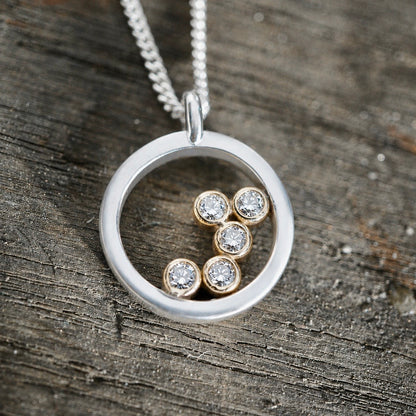 Stardust - Silver halo necklace with diamonds and gold