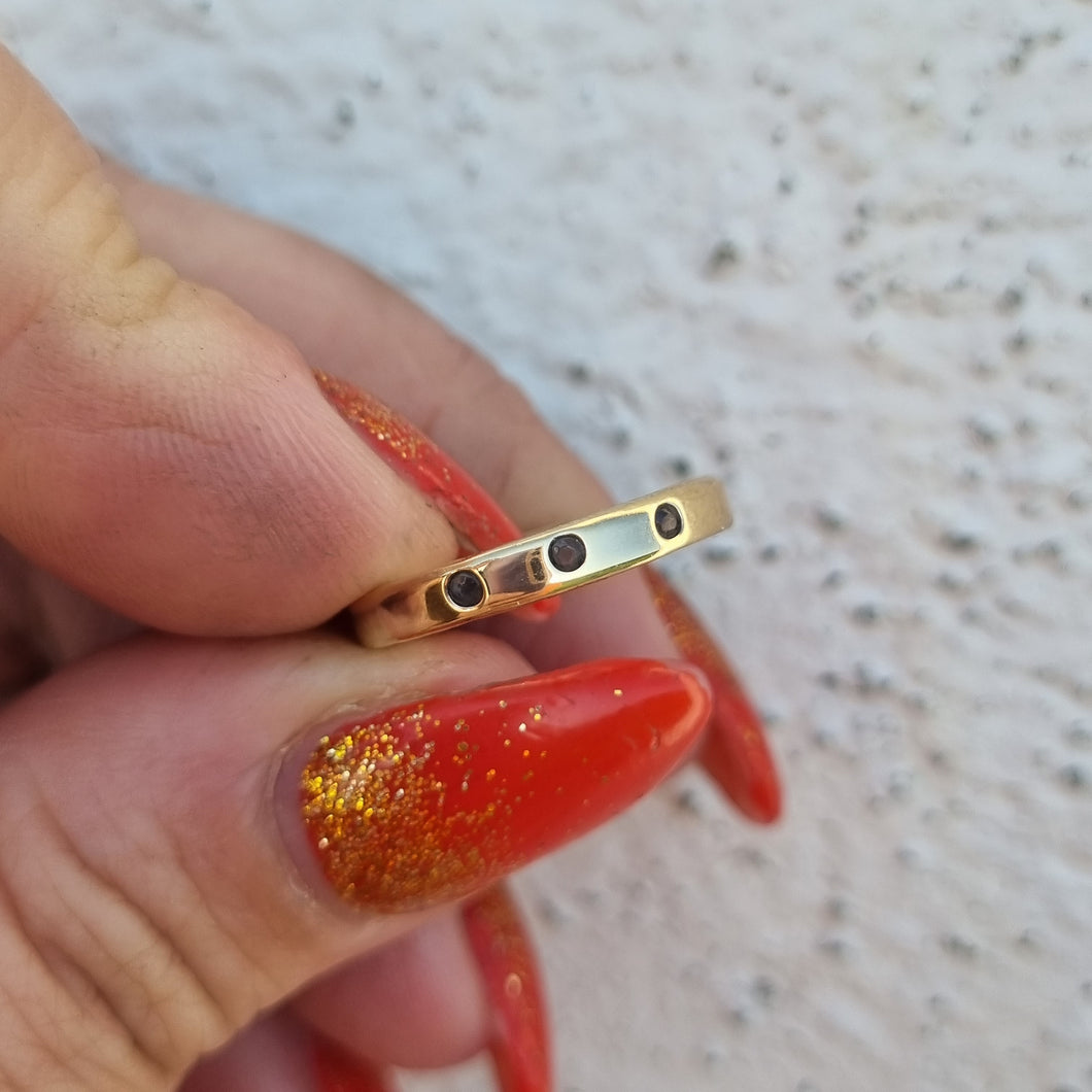 Item 229 - Solid yellow gold ring with 3 x tanzanites - (Size L)