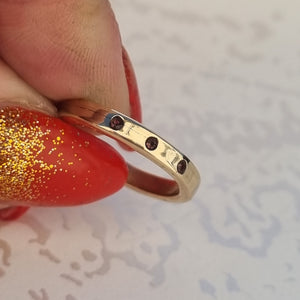 Item 230 - Solid yellow gold ring with 3 x pink tourmalines - (Size M)
