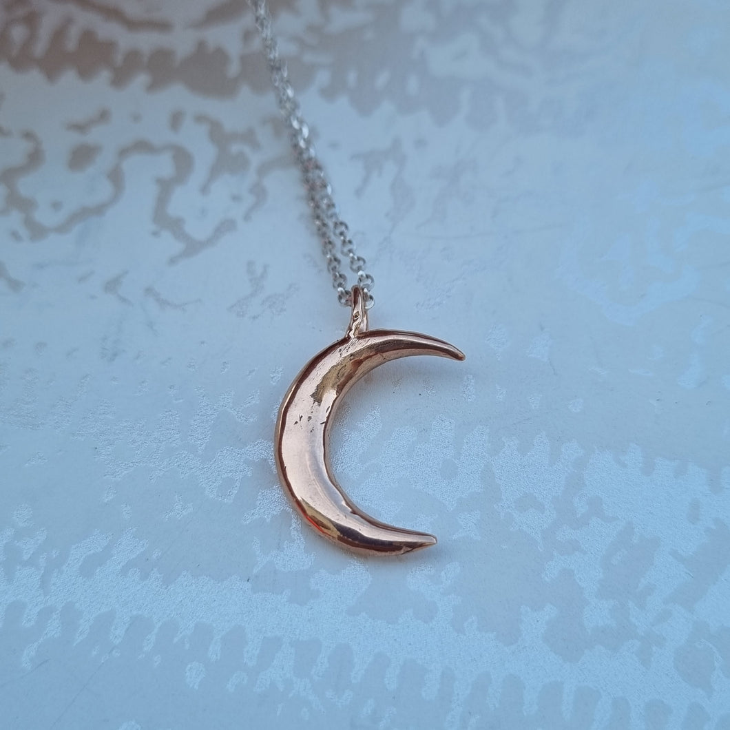 Item 242 -  Rose gold crescent moon