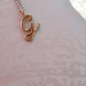 Item 264 - Yellow gold G necklace