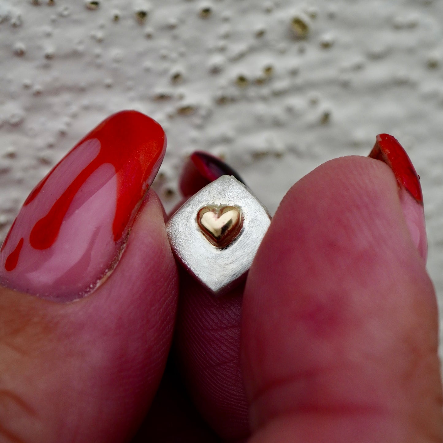Square earrings with hearts