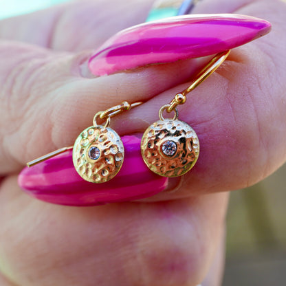 Gold gong earrings with diamonds