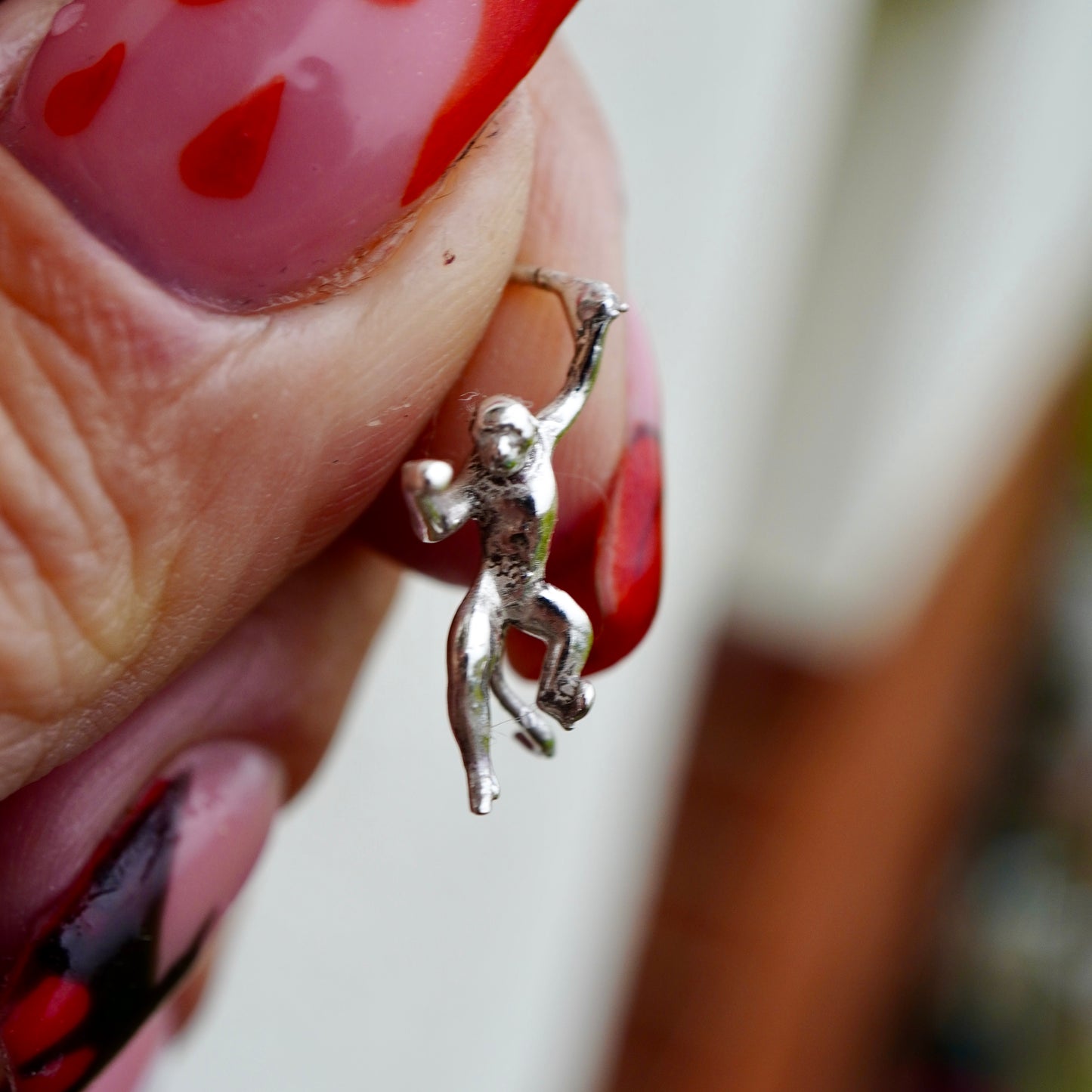 Silver monkey earrings