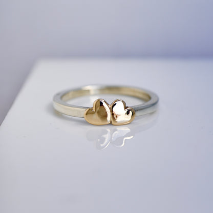 2 gold hearts with medium band