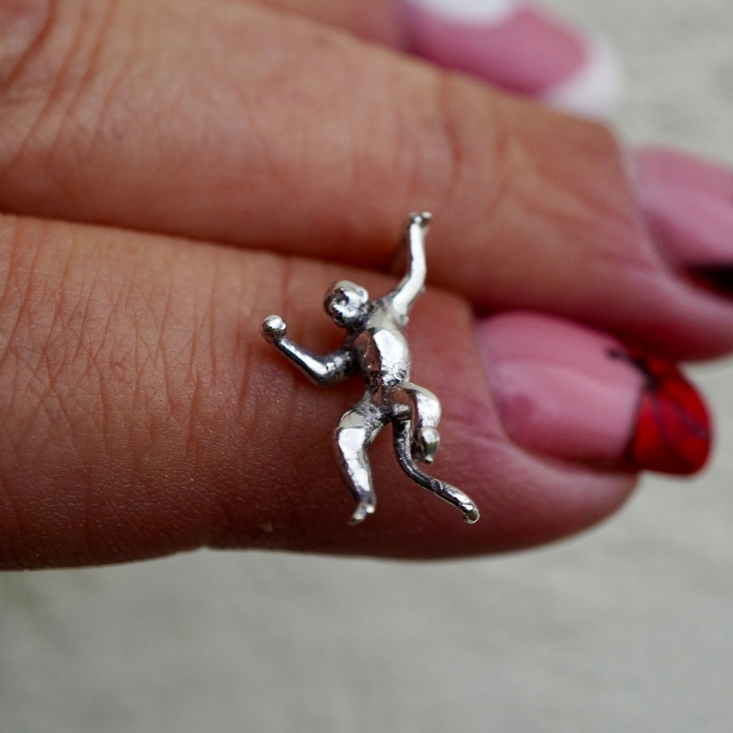 Silver monkey earrings