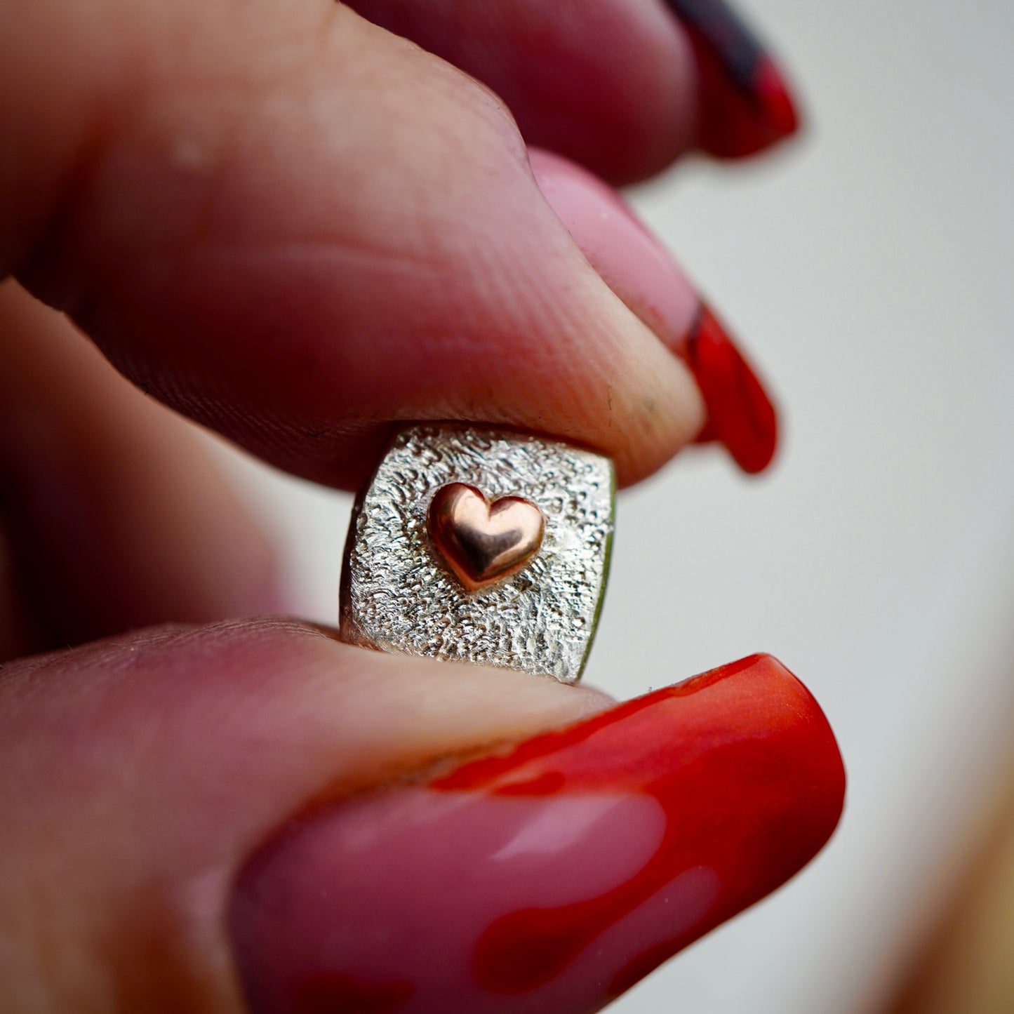 Square earrings with hearts