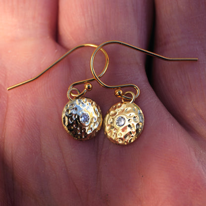 Gold gong earrings with diamonds